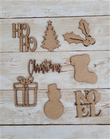 Noel chipboard punchout embellishment